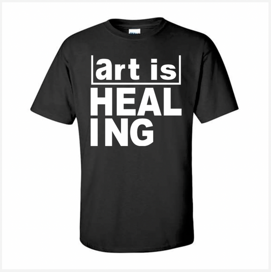 Black t-shirt with 'art is HEALING' text on a white background